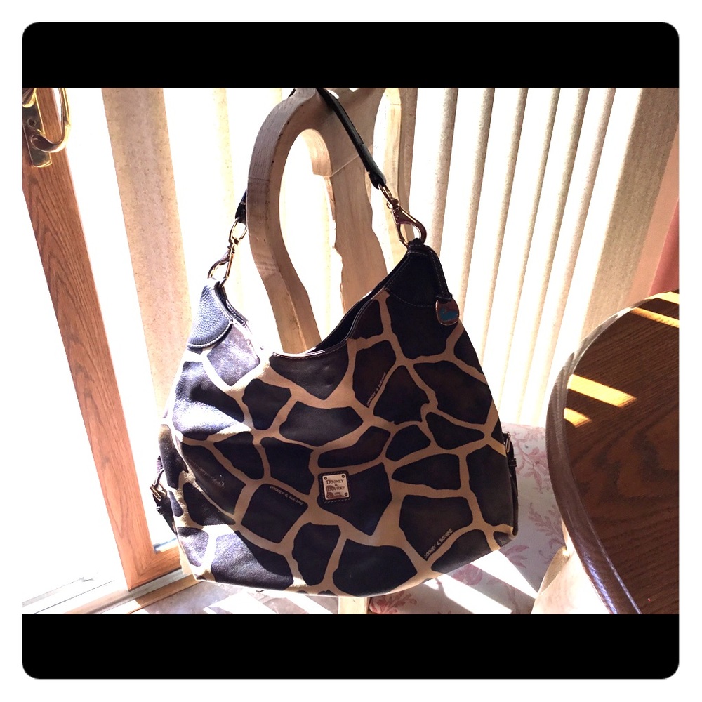 Dooney & Bourke giraffe print satchel bag.